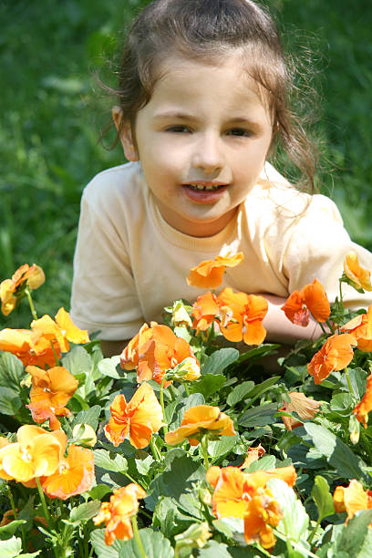 istock Girl with yellow flower 89270849