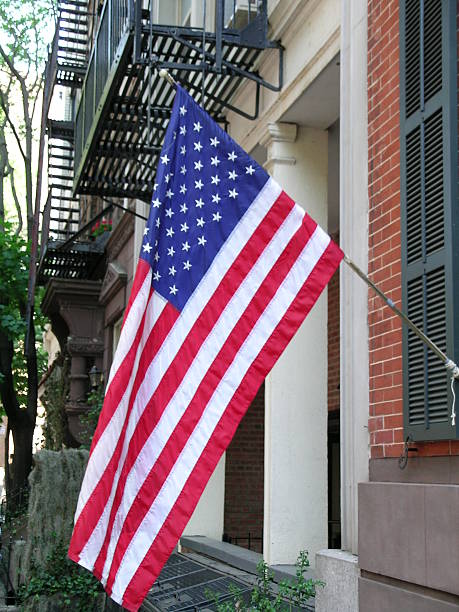 istock American Flag Flying In Front Of Building 89270986