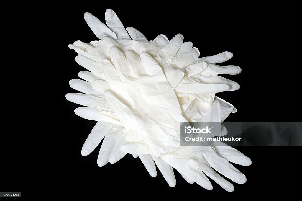 Latex gloves isolated on black  Care Stock Photo