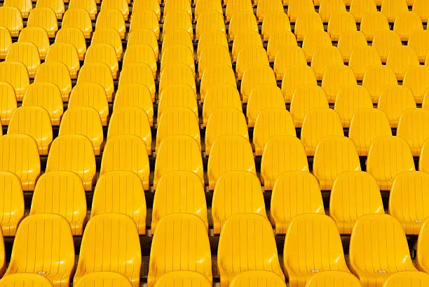 Photo of Yellow stadium seats background