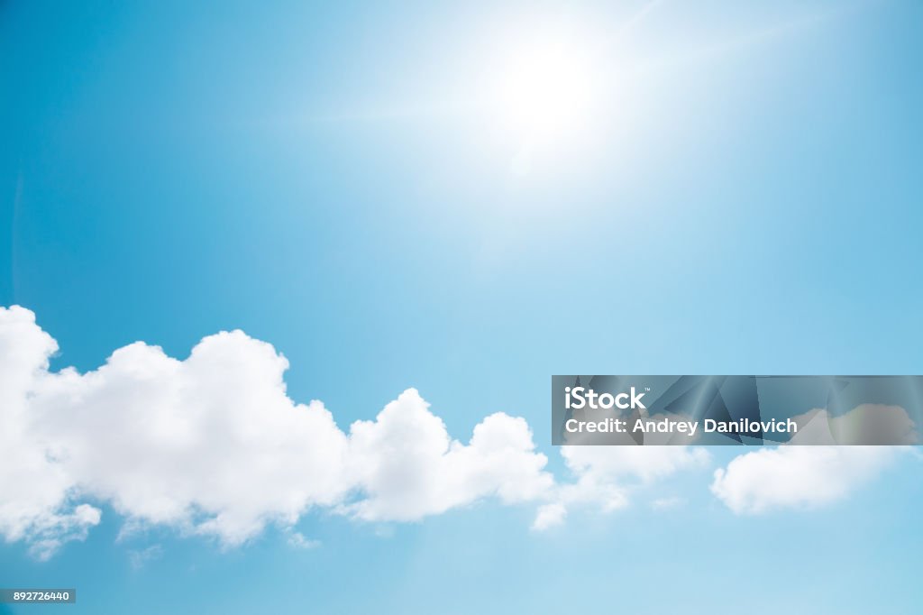 Sky with few clouds and sun Cloudy sky with sun Cumulus Cloud Stock Photo