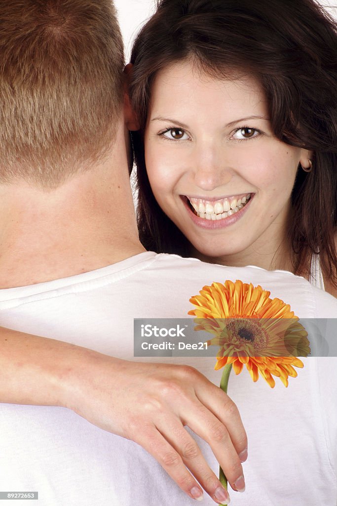 Mujer feliz tienen su novio y una flor - Foto de stock de Adulto libre de derechos