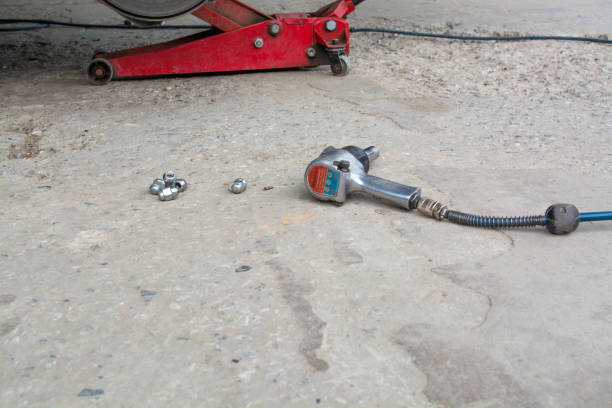istock Air gun for tighten tire bolts. 892742556