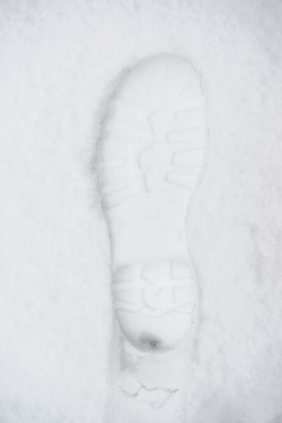 Track of a boot in the snow, foot print