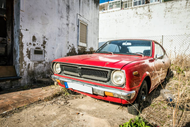 istock Red, classic,vintage car in a bit abounded place 892776032
