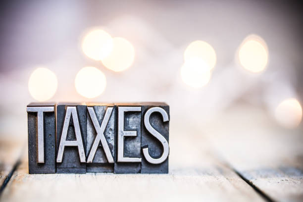 istock Taxes Concept Vintage Letterpress Type Theme 892784554