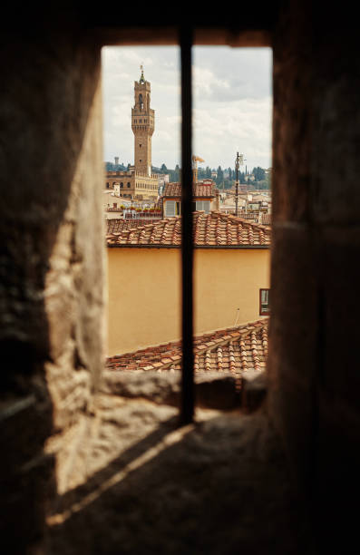 istock Beautiful view, through the old window on Palazzo Vecchio 892790580