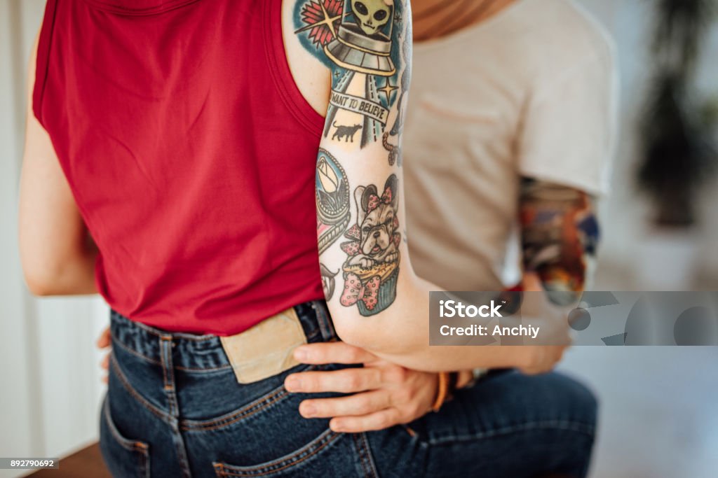 Close Up Of A Tattoo Man Hugging Tattoo Woman Stock Photo - Download Image  Now - Couple - Relationship, Tattoo, 20-29 Years - iStock