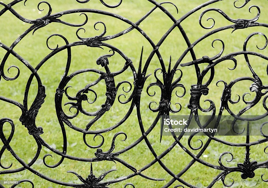 witch and witchcraft symbols on a wrought iron gate  Black Color Stock Photo