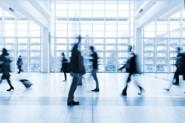 istock blurred people walking in Frankfurt building 892807500