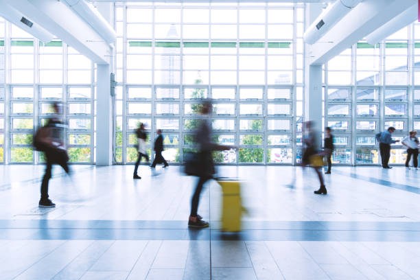 istock blurred people walking in Frankfurt building 892807504