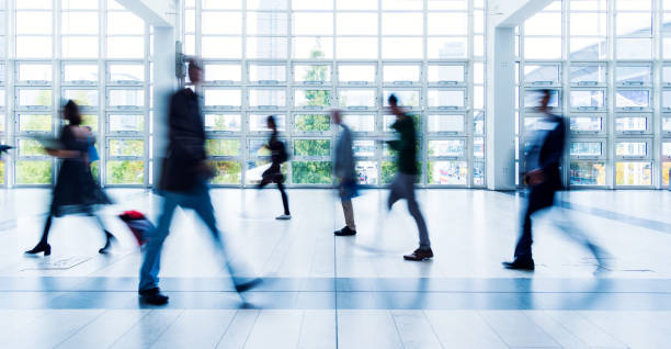 istock blurred people walking in Frankfurt building 892807510