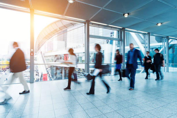 istock blurred people walking in Frankfurt building 892807526