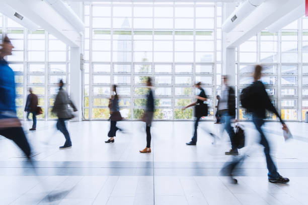 istock blurred people walking in Frankfurt building 892807552