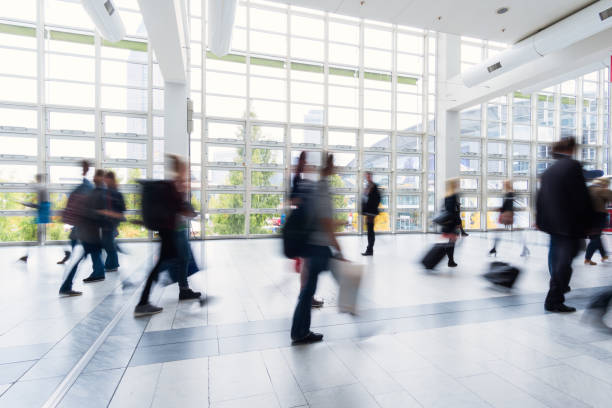 istock blurred people walking in Frankfurt building 892807554