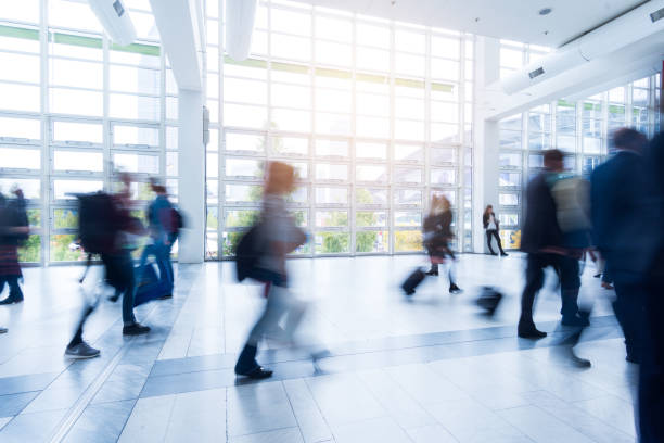 istock blurred people walking in Frankfurt building 892807558