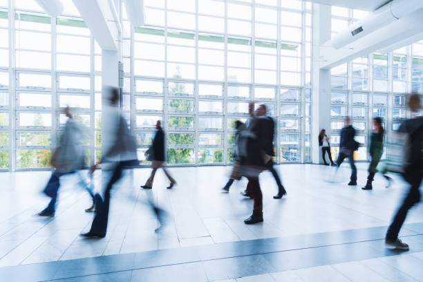 istock blurred people walking in Frankfurt building 892807560