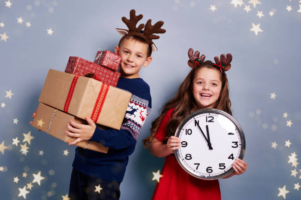 istock Children waiting for new year and christmas 892807564