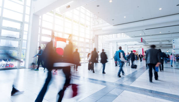 istock blurred people walking in Frankfurt building 892807570