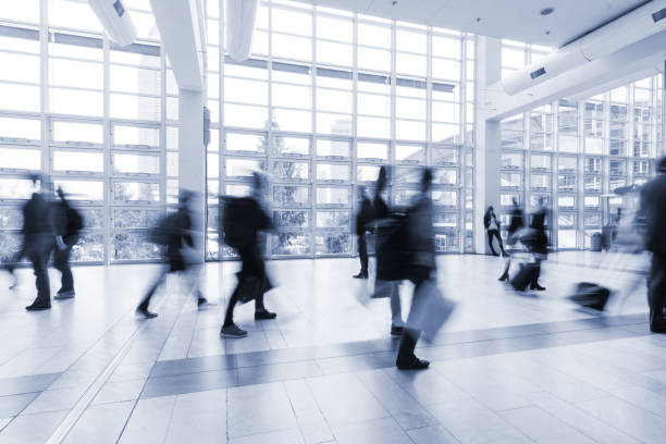 istock blurred people walking in Frankfurt building 892807584