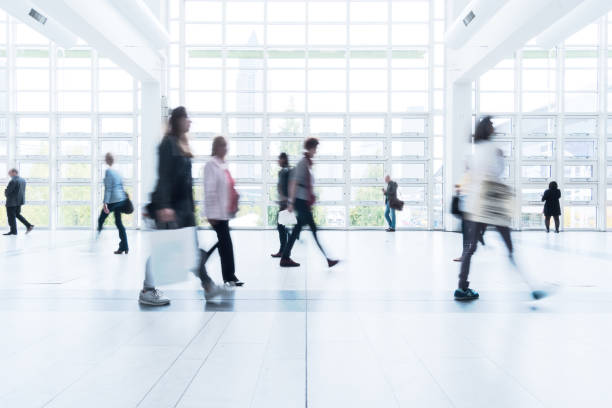 istock blurred people at Frankfurt trade fair 892807604
