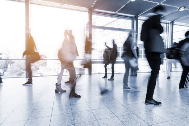 istock blurred people at Frankfurt trade fair 892807606