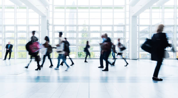 istock blurred people at Frankfurt trade fair 892807610