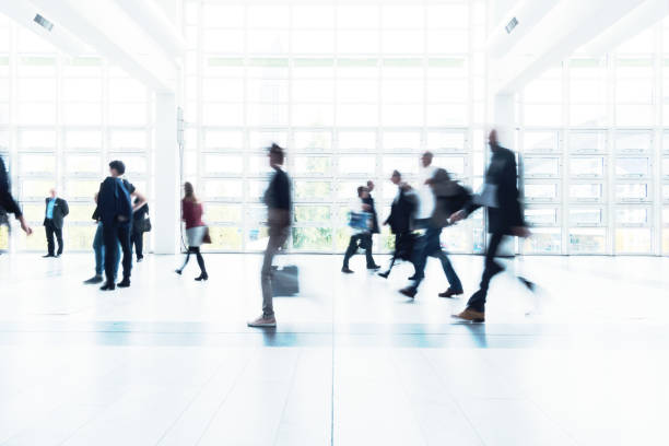 istock blurred people at Frankfurt trade fair 892807620