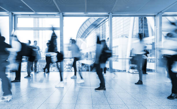 istock blurred people at Frankfurt trade fair 892807622