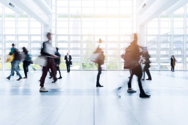 istock blurred people at Frankfurt trade fair 892807626
