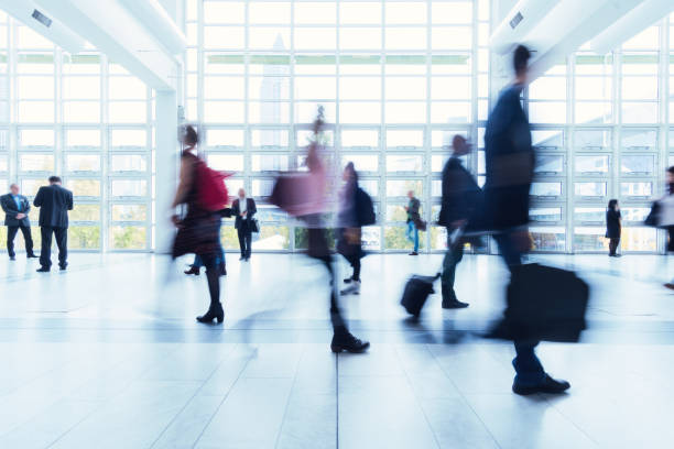 istock blurred people at Frankfurt trade fair 892807630