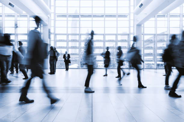 istock blurred people at Frankfurt trade fair 892807634