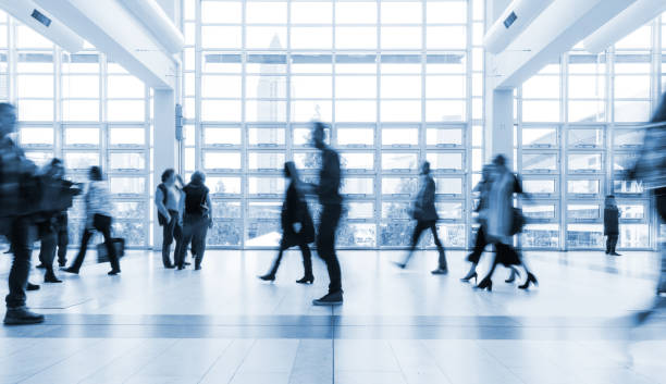 istock blurred people at Frankfurt trade fair 892807640