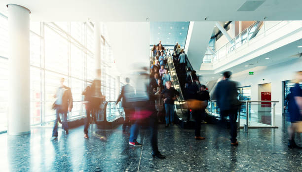 istock blurred people at Frankfurt trade fair 892807668