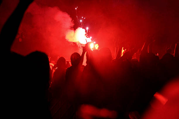 istock Signal flare in a rioting crowd. 89280878