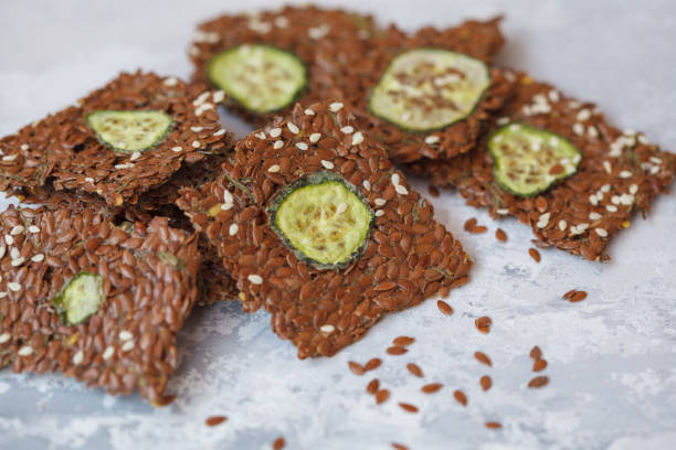 istock Crispy vegetable flax crispbread with sesame seeds and herbs. 892826336