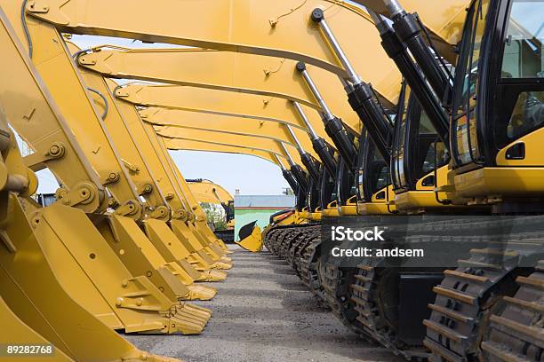 Earth Movers Stock Photo - Download Image Now - Equipment, Heavy, Backhoe