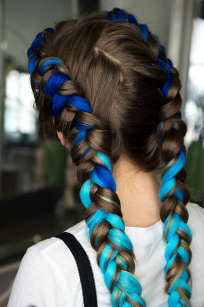 istock Woman  with two blue braids 892831210