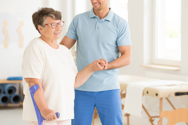 istock Disabled elderly woman after injury 892834824