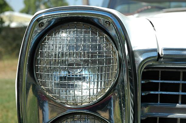 istock Vintage headlight with grill on a 1070's ford car 89283643
