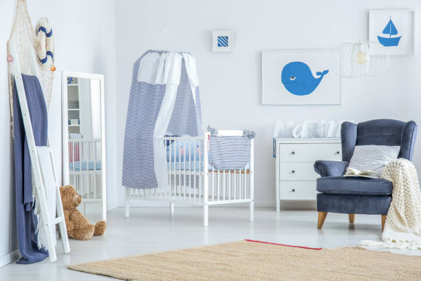 istock Brown carpet in baby's room 892839398