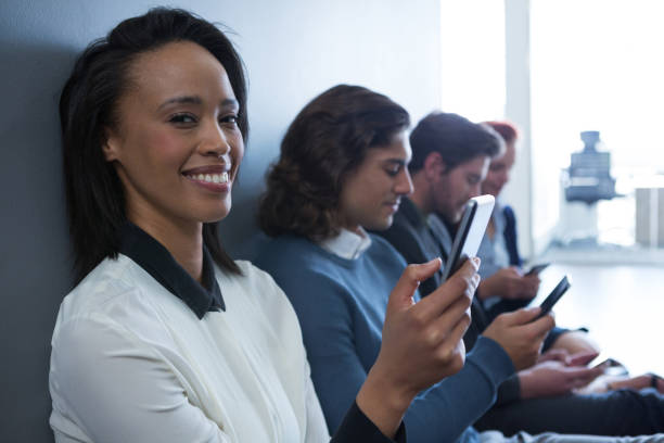 istock Team of business people using mobile phone 892841100