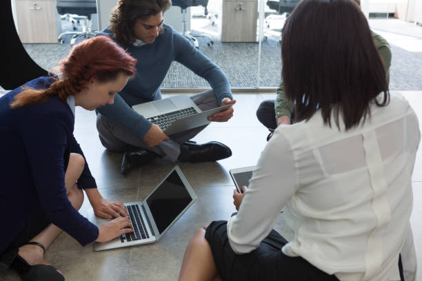 istock Business colleagues working on laptop and digital tablet 892842274