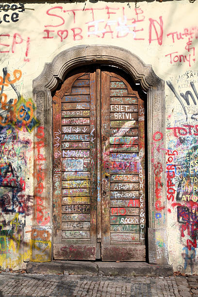 istock Wooden door with graffiti 89284637