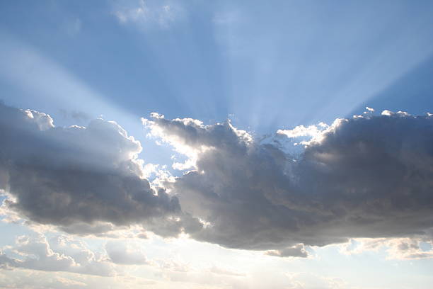 istock Heavenly Rays of Light breaking out from clouds 89284711