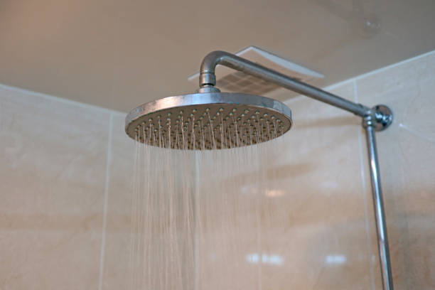 istock Modern hot shower with stream of water 892855396