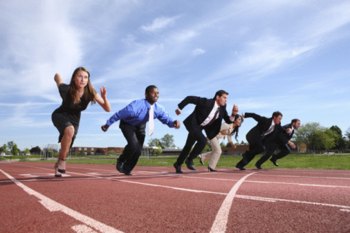 Las personas de negocios en la pista de carreras photo