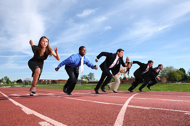 business people racing on track - sportrace stockfoto's en -beelden