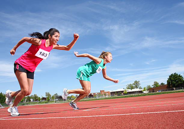 istock Two women running on track 89285845