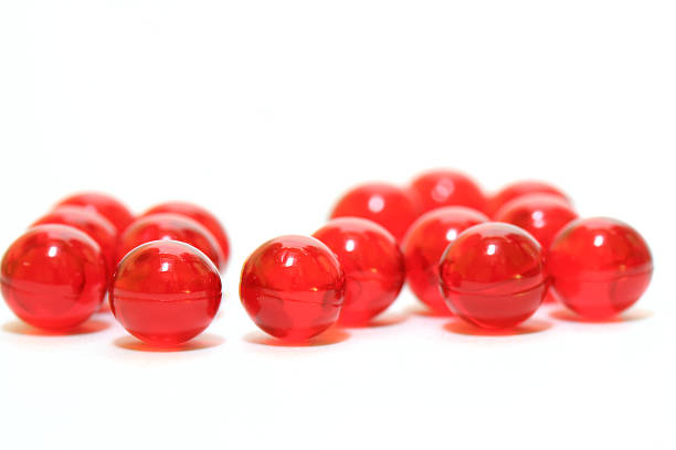 istock Bunch of bright red pills on a white background 89286953